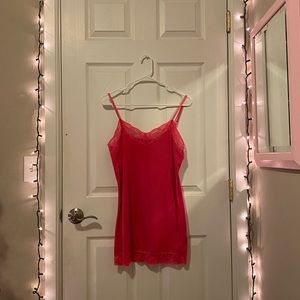 hot pink slip-like dress best fits a medium or small